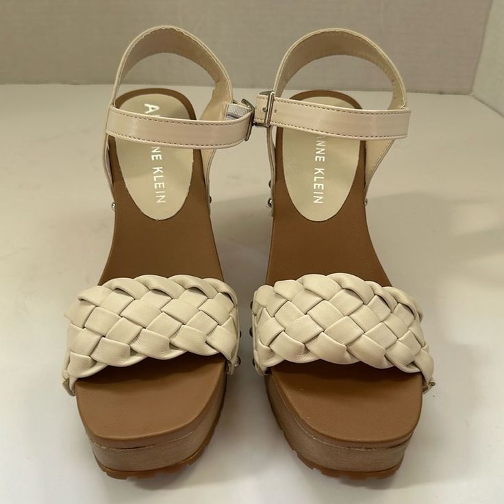 Anne Klein White Lori's Woven Ankle Strap Trendy Cream Wedge Sandals With Round Toe, Casual White Heels With Heel Loop, Casual Ankle Strap Heels With Reinforced Heel, Casual Heels With Ankle Strap And Reinforced Heel, Cream Wedge Sandals With Heel Strap And Round Toe, Cream Ankle-high Summer Heels, Beige Ankle-high Synthetic Heels, Casual Ankle Strap Heels With Woven Sole, Casual Cream Heels With Ankle Strap