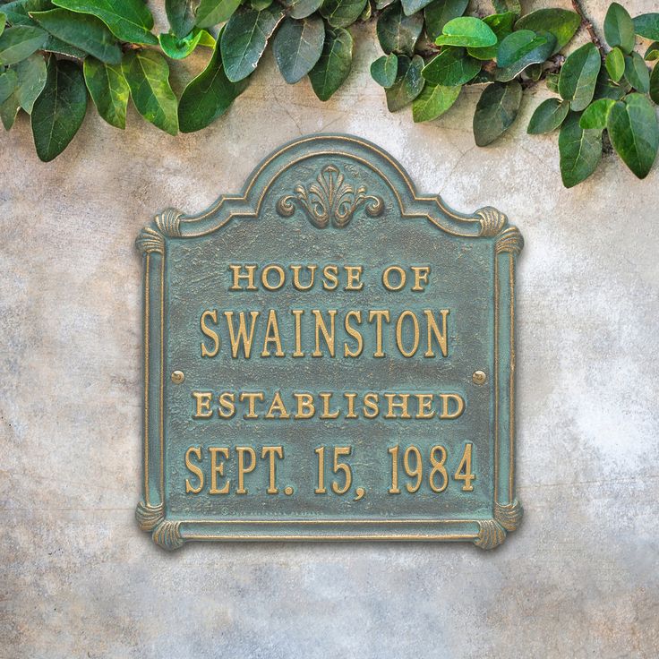 a plaque on the side of a building that says house of swanston established sep 15, 1994