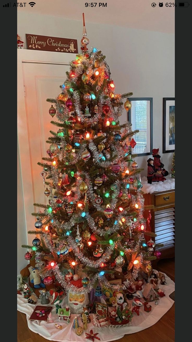 a decorated christmas tree in a living room