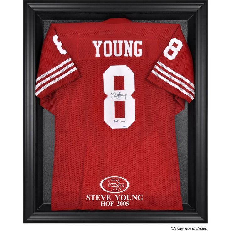 a football jersey in a framed case