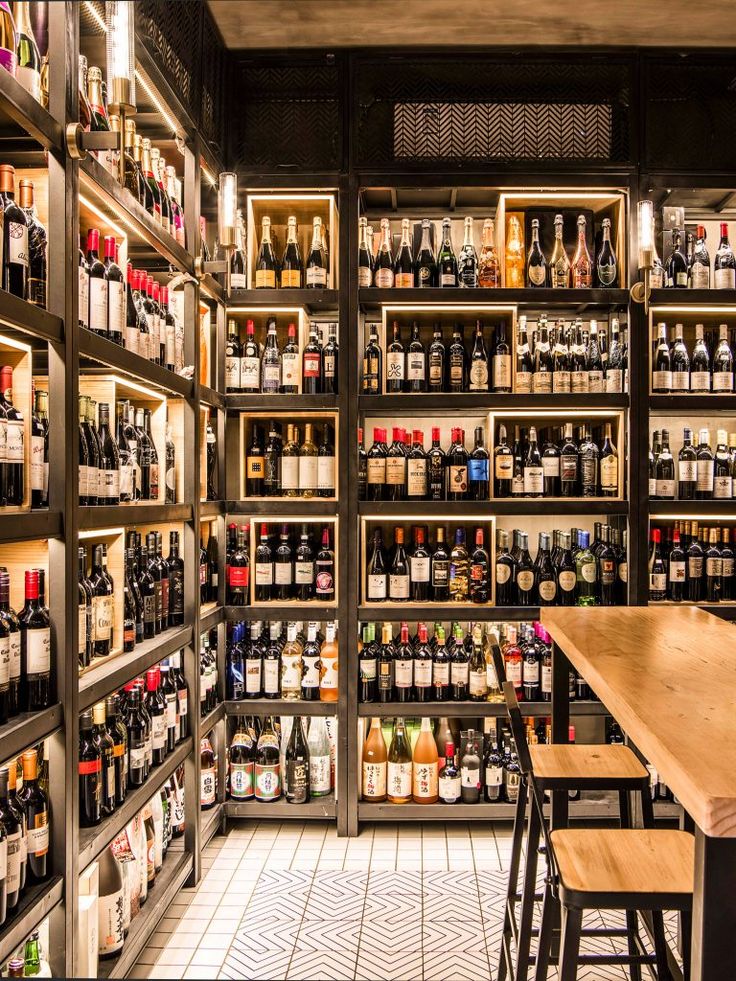 a wine store with shelves full of bottles