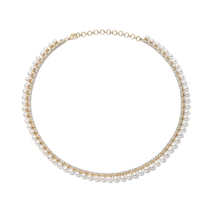 The Pearl and Diamond Tennis Necklace combines the timeless elegance of pearls with the dazzling brilliance of diamonds to create a piece of jewelry that's both classic and striking. The contrast between the lustrous freshwater pearls and the sparkling diamonds makes for a stunning visual effect. Perfect for any formal occasion or as a luxurious everyday accessory. Available in 14K Yellow Gold Diamond weight = 2.63 carats Chain length = 14in with adjustable 2in chain Diamond Tennis Necklace, Diamond Cocktail Rings, Tennis Necklace, Band Bracelet, Diamond Shop, The Pearl, Bracelet Collection, Earrings Collection, Ring Collections