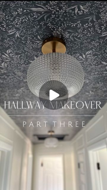 a hallway with a chandelier hanging from it's ceiling and the words hallway makeover part three