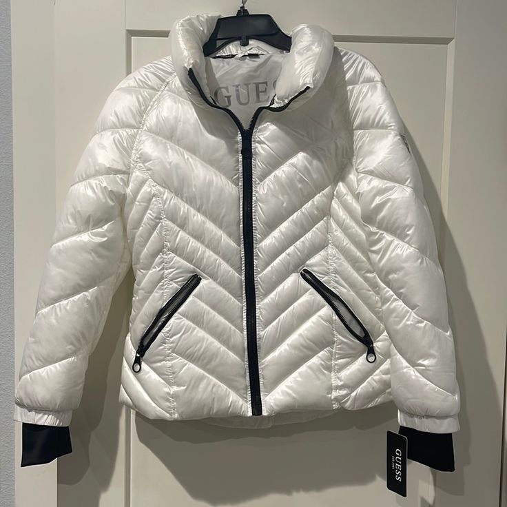 Guess M White Jacket White Quilted Jacket For Spring, White Nylon Outerwear With Zipper Closure, Casual Winter White Nylon Outerwear, White Fitted Quilted Jacket For Fall, White Puffer Jacket With Zipper For Outdoor, White Outdoor Puffer Jacket With Zipper Closure, White Quilted Jacket For Winter Cold Weather, Winter White Quilted Jacket For Cold Weather, White Quilted Winter Jacket For Cold Weather