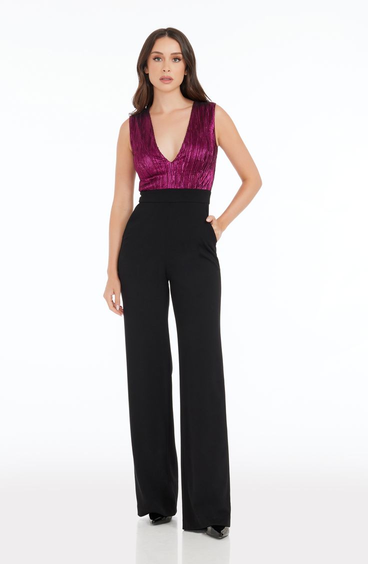 The Everette Jumpsuit is the perfect addition to your wardrobe. Featuring a sleeveless plunge neckline and wide leg design, this jumpsuit will keep you looking sleek and stylish. Crafted from premium fabrics, the Everette Jumpsuit ensures a polished look for any occasion. V-neck Jumpsuit With Pockets For Night Out, Non-stretch V-neck Jumpsuit For Night Out, Black V-neck Jumpsuit For Evening, Evening Stretch Jumpsuit With V-neck, Fitted V-neck Sequin Jumpsuit, Plunge Neckline, Leg Design, Black Jumpsuit, Plunging Neckline