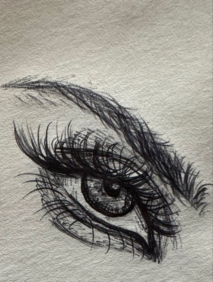 a drawing of an eye with long lashes