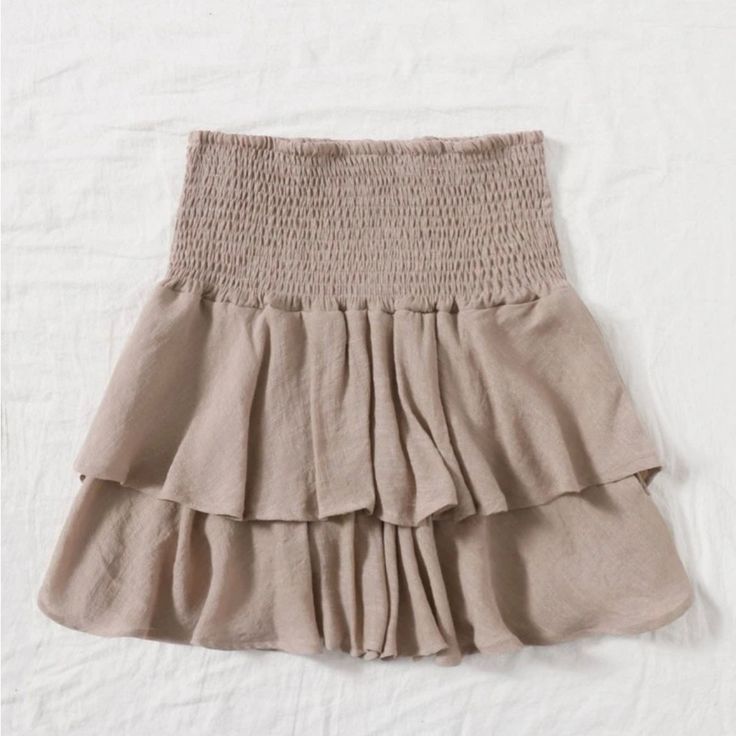 Brand New Mini Skirt, Never Worn, Very Pretty Size L Pleated Tiered Skirt For The Beach, Pleated Tiered Beach Skirt, Pleated Tiered Skirt For Beach, Tiered Pleated Beach Skirt, Beach Pleated Tiered Skirt, Beige Ruffled Flowy Skirt, Beige Ruffled Relaxed Bottoms, Pleated Tiered Skirt Bottoms For Beach, Beige Pleated Tiered Skirt Bottoms