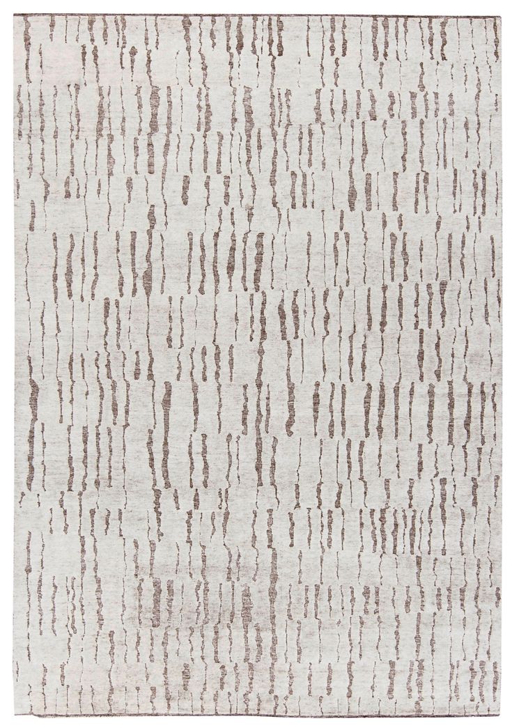 a white rug with brown stripes on it