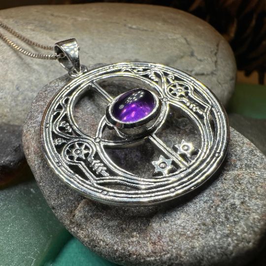 TAKE AN ADDITIONAL 20% OFF THE ALREADY REDUCED SALE PRICE - ADDITIONAL 20% IS DEDUCTED AT CHECKOUT with code SAVE20 Solid Sterling Silver 1 1/4" x 1 1/4" pendant with your choice of authentic gemstone. Considered a focus of peace, spirituality, and healing for people of all faiths, the Chalice Well is awe inspiring. The Sterling Silver Chalice Well Pendant is crafted from fine sterling with intricate details, reflecting the sacred beauty of the Chalice Well and unmatched craftsmanship. Choose fr Collectible Mystical Necklace, Collectible Mystical Round Necklace, Mystical Round Engraved Jewelry, Celestial Round Collectible Necklaces, Moon Phase Spiritual Jewelry, Purple Celestial Round Jewelry, Celestial Purple Round Jewelry, Celestial Style Round Amethyst Jewelry, Celestial Round Amethyst Jewelry