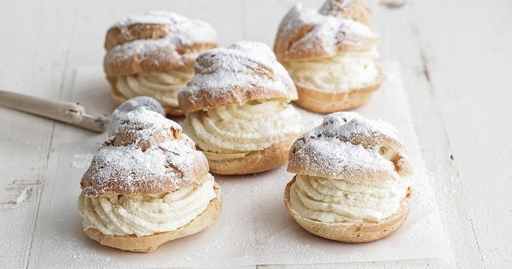 small pastries with powdered sugar on top