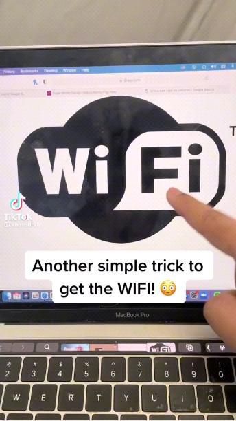 someone is pointing at the wifi logo on their laptop screen, which reads another simple trick to get the wifi