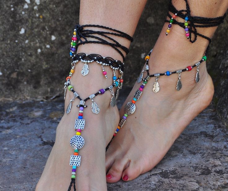 This listing is for one anklet. Beautiful macrame anklet. You can wear it alone or in combination with the barefoot sandals available in my shop (picture 1, 3 and 6) https://www.etsy.com/listing/218100733 This anklet is made with waxed polyester cord, tibetan silver beads, tibetan silver leaf charms and achira seed beads. They close with a lobster claw and on the other side a small chain allows to adjust the length of the anklet. The anklet comes in a beautiful silk pouch. This anklet is made to Black Bohemian Bracelets For Festivals, Ankle Wrap Jewelry For Summer Festivals, Silver Bohemian Anklets For Beach Season, Adjustable Ankle Wrap Bracelet For Festivals, Handmade Black Barefoot Sandals For Beach, Black Anklets For Summer Vacation, Bohemian Multicolor Anklets For Beach Season, Beach Festival Toe Ring Anklets, Adjustable Black Ankle Strap Anklets