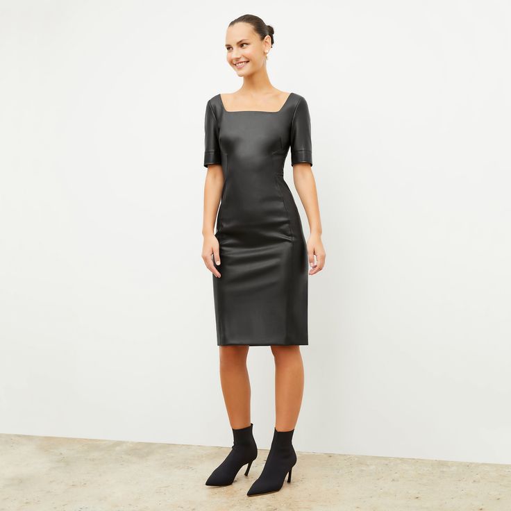 This classic sheath dress features elbow-length sleeves, an elegant square neckline, and a tailored fit. In other words, this silhouette is a go-to for whenever you want to make a subtly sexy statement with minimal styling effort. The vegan leather features a water-resistant coating and has a soft, buttery feel that means it will crease over time with wear. Fitted H-line Midi Dress For Cocktail, Chic Fitted Midi Dress With Square Neck, Elegant Fitted Bodycon Dress With Straight Neckline, Fitted Square Neck Midi Dress, Elegant Square Neck Bodycon Evening Dress, Sleek Fitted Midi Dress With Square Neck, Sleek Square Neck Fitted Midi Dress, Sleek Fitted Square Neck Midi Dress, Elegant Bodycon Dress With Square Neck And Fitted Bodice