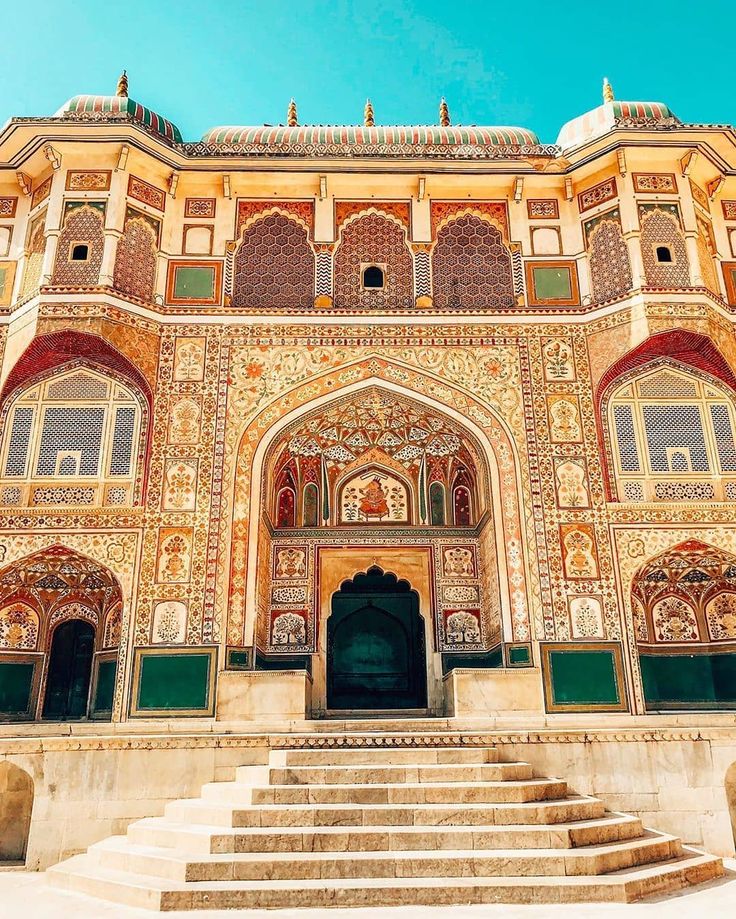 an ornate building with steps leading up to it