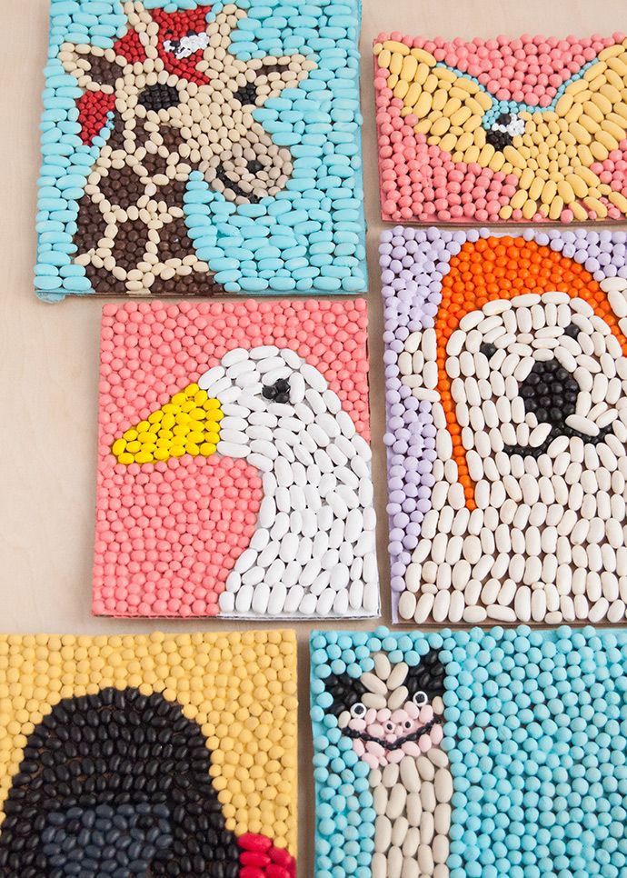 four square paintings with different animals painted on them and beaded together in the shape of squares