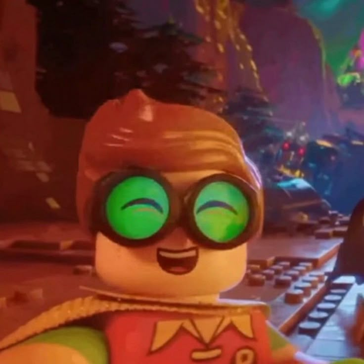 the lego movie character is wearing green eyes