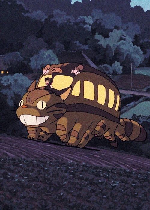 a cartoon character riding on the back of a large animal in a field at night