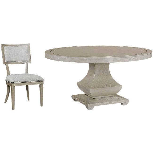 a white table and two chairs next to each other on a white background, with one chair up against the table