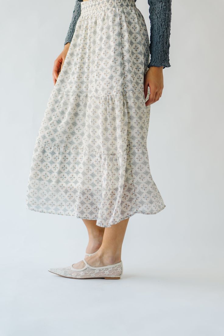 Get ready to twirl in style with the Antosh Tiered Patterned Midi Skirt! This cream-colored skirt features playful tiers and a unique pattern for a fun and quirky look. Perfect for adding personality to any outfit, this skirt will have you feeling confident and stylish. Details self/lining: 100% polyester Fabric Care Guide Here Sizing & Fit Measurements are approximate and taken while laying flat across the front. Not doubled. small: waist = 14"; length = 33" medium: waist = 15"; length = 33" la Casual Tiered Pleated Maxi Skirt, Spring Tiered Maxi Skirt With Gathered Details, Relaxed Tiered Maxi Skirt With Lining, Spring Tiered Maxi Skirt With Lining, Lined Tiered Maxi Skirt For Spring, Tiered Lined Maxi Skirt For Spring, White Flowy Full Skirt Bottoms, Flowy Tiered Bottoms For Vacation, Flowy Tiered Skirt With Gathered Details