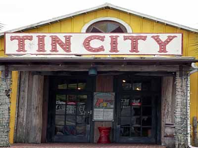 the front entrance to tin city restaurant