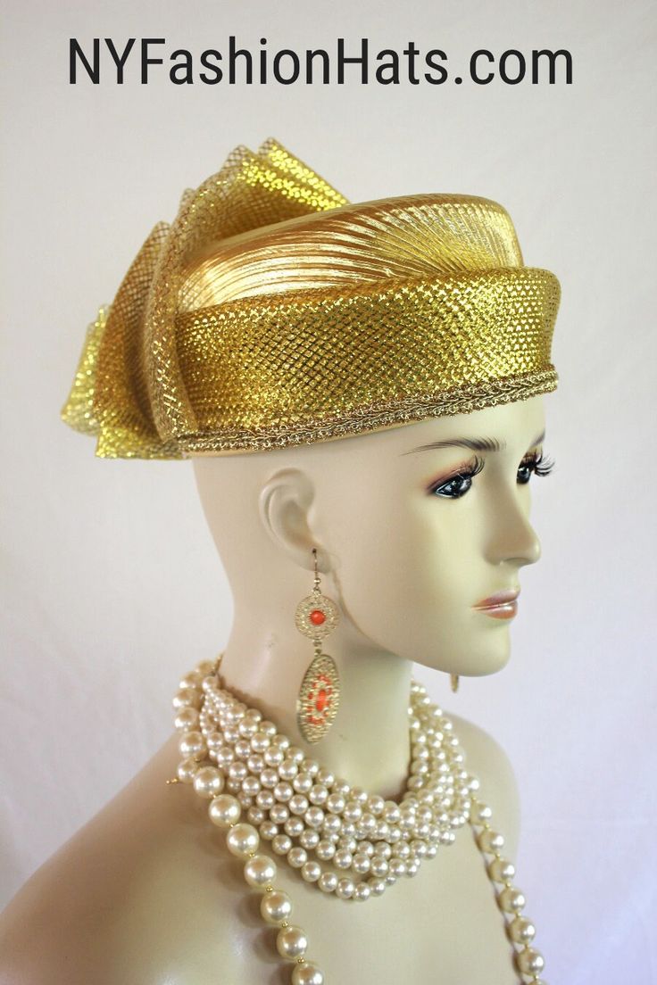 Women's Couture Designer Metallic Gold Pleated Lame Fabric Pillbox Big Bow Fashion Hat. A Large Decorative Metallic Gold Horsehair Bow Is Embellished On This Simple Yet Very Elegant Dress Hat. Metallic Gold Horsehair Surrounds The Lower Portion Of The Crown Decorated With A Simple Trim. This Hat Can Also Be Work As A Casual Statement Piece. The Bow Can Be Worn Toward The Face Or Toward The Back Of The Head. This Statement Metallic Gold Pillbox Cocktail Hat Is Custom Made And Designed By NY Fashion Hats Couture Millinery Headwear Apparel. This Hat Is Suited For Weddings, Brides, Mother Of The Bride, Church, Temple, Funerals, Sabbath, Holidays, Formal Affairs, Horse Races And Special Occasion Events And Gatherings. This bespoke premium quality dress hat is suited for Winter Fall And Early Sp Brides Mother, Classy Hats, Horse Races, Bow Fashion, Lame Fabric, Bridal Hat, Head Pieces, Gold Lame, Cocktail Hat