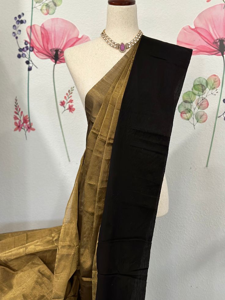 This Chanderi tissue saree is perfect for those looking to add a touch of elegance to their wardrobe. Comfortable to wear for any occasion. The unique texture of the saree adds a touch of sophistication, making it a timeless piece for any fashion-forward individual. fall & pico done Unstitched Slub Silk Blouse Piece For Party, Party Wear Slub Silk Saree With Unstitched Blouse, Party Saree With Unstitched Blouse In Slub Silk, Slub Silk Saree With Sheer Dupatta, Elegant Designer Pre-draped Slub Silk Saree, Elegant Formal Cotton Silk Pre-draped Saree, Elegant Formal Pre-draped Cotton Silk Saree, Festive Saree With Sheer Dupatta In Slub Silk, Gold Bollywood Style Pre-draped Cotton Silk Saree