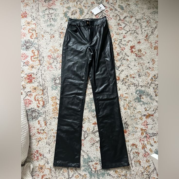 Zara High Waisted Leather Pants Size: Us 2. Slits At The Bottom Of The Opening Of The Pant Leg. Fleece Inside. Working Pockets. Zipper And Button Front Closure. Never Before Worn. New With Tags. Trendy Non-stretch Straight Leg Leather Pants, Trendy Non-stretch Leather Pants, Fitted Trendy Leather Pants, Trendy Full-length Leather Pants For Going Out, Fitted Leather Bottoms For Date Night, Trendy Fitted Straight Leather Pants, Fitted High Rise Leather Pants For Night Out, Spring Leather Pants Fitted For Going Out, Fitted Leather Pants For Spring Outings