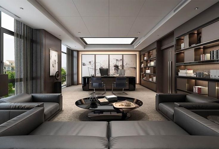 a living room filled with lots of furniture and bookshelves on the wall next to large windows