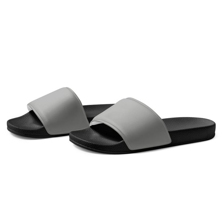 Looking for a stylish and practical pair of slides for your next beach or pool day? Check out our Bombay Color Women's Slides! These slides are perfect for those who want a no-fuss, casual look that still looks great. With their simple design and comfortable fit, these slides are sure to become your go-to choice for any summer outing. So why wait? Add these Bombay Color Women's Slides to your c today and get ready to hit the beach in style! Women's Slides Product Details: • Comfortable Strap: Fe Casual Gray Slip-on Sport Sandals, Casual Gray Slip-on Flip Flops, Comfortable Gray Sandals For Summer, Sporty Slip-on Sandals For Beach, Sporty Open Toe Sandals For Beach, Non-slip Slide Slippers For Swimming, Gray Sandals For Summer Vacation, Gray Flat Sandals For The Beach, Casual Non-slip Slide Slippers