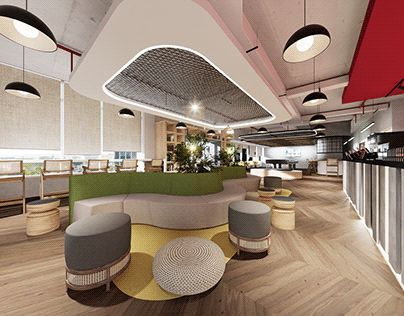 the interior of a modern office with wood flooring and green couches, stools and tables