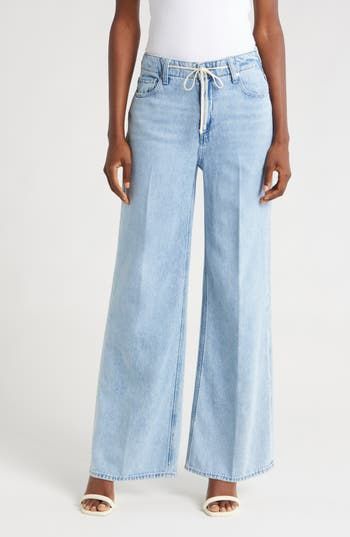 A tie at the high waist adds weekend-ready style to full-length, casual-chic wide-leg jeans made from soft, nicely draped nonstretch denim. 30 1/2" inseam; 22" leg opening; 11 1/2" front rise; 16" back rise (size 29) Tie waist Five-pocket style 60% cotton, 40% lyocell Machine wash, tumble dry Imported Elegant Wide-leg Spring Jeans, Elegant Wide-leg Jeans For Spring, Elegant Spring Wide-leg Jeans, Elevated Casual Wide Leg Denim Flare Jeans, Chic Relaxed Fit Jeans For Elevated Casual Look, Wide Leg Flare Jeans For Elevated Casual Occasions, Spring Wide-leg Jeans For Workwear, Chic Straight Leg Jeans For Elevated Casual, Chic Straight Leg Jeans For Elevated Casual Occasions