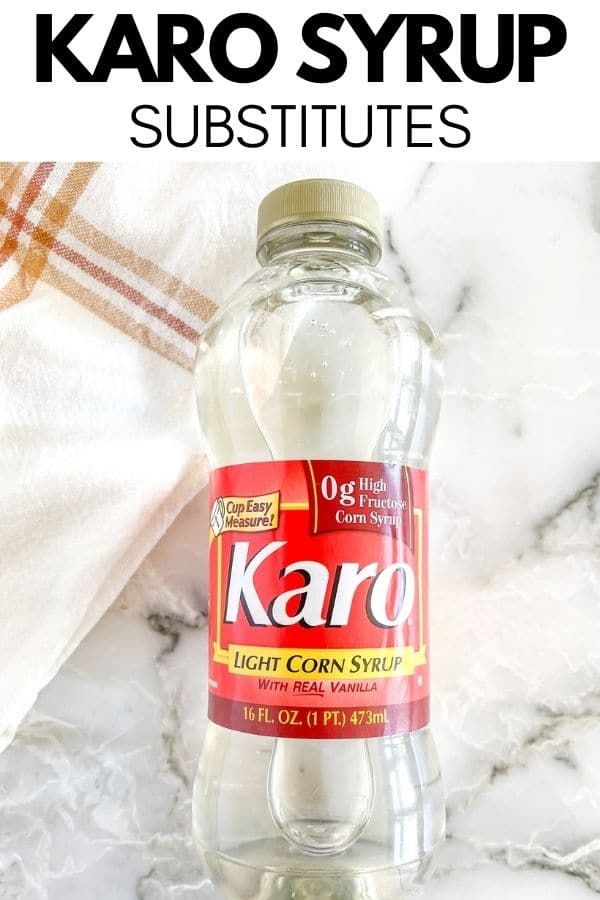 a bottle of karo syrup sitting on top of a white marble counter next to a towel