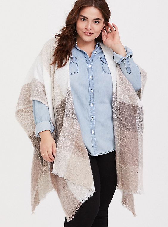 Soft and oversize, this plaid knit ruana is comparable to a blanket with a fringe trim adding slight movement. Open front. Wrap sleeves let you style it a variety of ways. Fringe trim. CONTENT + CARE: Polyester. Hand wash; line dry. Imported plus size wrap. SIZE + FIT: Model is 5'8”. The best plus size women's ivory multicolor plaid ruana capes ponchos & ruanas in multi. Torrid is your destination for cozy fall and winter clothes to keep you warm and comfortable. Cowl Neck Poncho, Capes & Ponchos, Plaid Blanket Scarf, Fitted Wedding Dress, Oversized Scarf, Dress For Success, Nagoya, Scalloped Lace, Fringe Trim