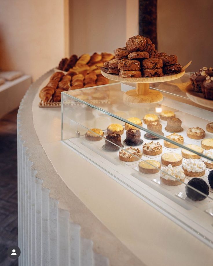 a display case filled with lots of different types of pastries