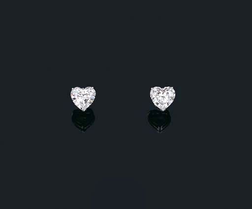 A PAIR OF DIAMOND EAR STUDS Price realised HKD 1,614,100 Estimate HKD 1,150,000 - HKD 1,240,000 Closed:  29 Apr 2002 Each set with a heart-shaped diamond weighing 3.26 and 3.58 carats, mounted in platinum Heart Shape Earrings Diamonds, Heart Shaped Diamond Earrings, Diamond Ear Studs, Heart Diamond Earrings, Diamond Heart Earrings, Luxurious Lifestyle, Heart Chain, Heart Shaped Earrings, Heart Shaped Diamond