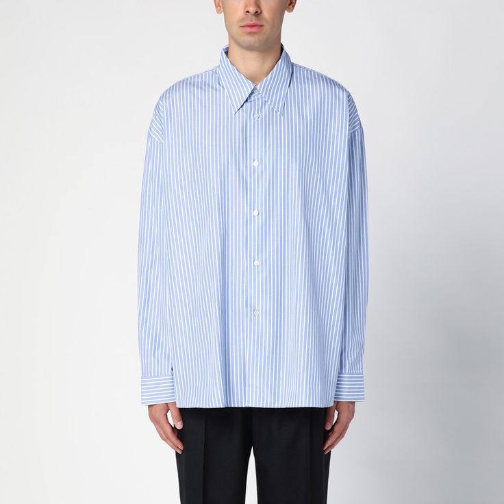 Blue and white striped cotton shirt from Studio Nicholson featuring a pointed collar, front button placket, long sleeves and button cuffs. Striped Business Shirt With Button Cuffs, Vertical Stripes Shirt For Office In Spring, Vertical Striped Shirt For Office In Spring, Spring Office Shirt With Vertical Stripes, Striped Shirt For Office In Spring, Striped Long Sleeve Shirt With Button Cuffs, Spring Office Shirt With Striped Collar, Vertical Stripes Button-up Business Shirt, Vertical Stripes Button-up Shirt For Business