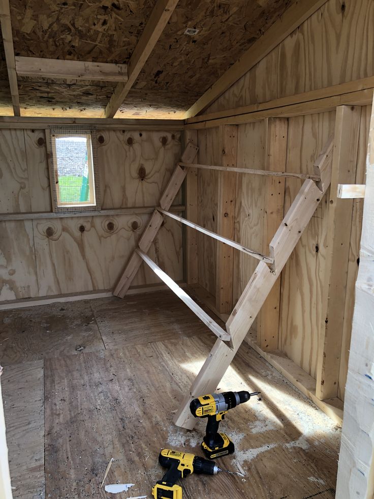 the inside of an unfinished room with tools on the floor