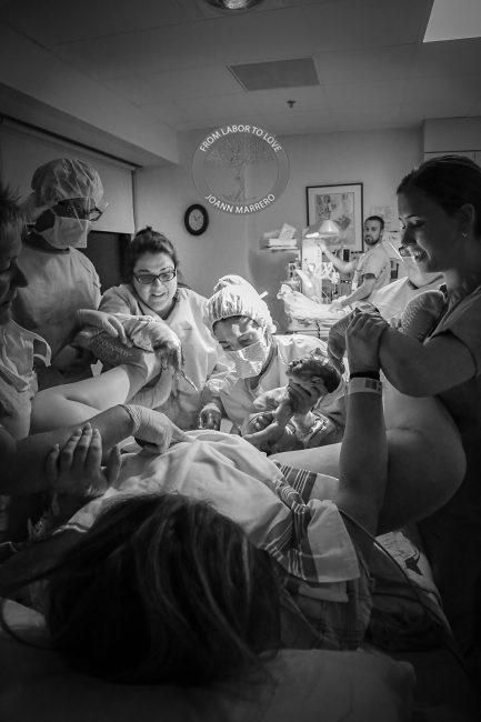 black and white photograph of nurses tending to a patient