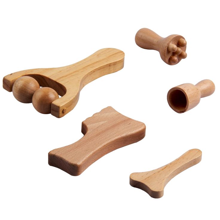 three wooden toys with handles and knobs on a white background, one is empty