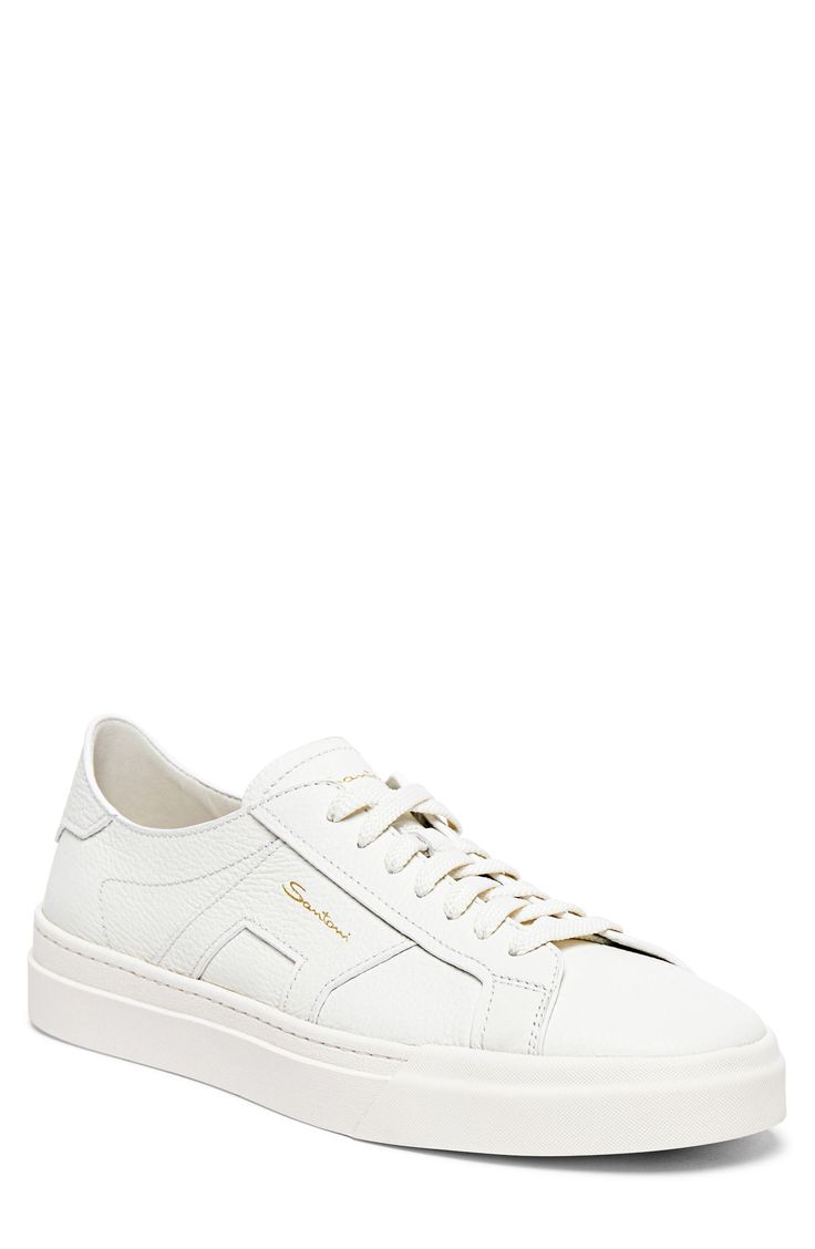 Buckle-inspired panels flank the sides of this low-profile leather sneaker designed with eye-catching branding for signature appeal. Lace-up style Leather upper and lining/rubber sole Made in Italy Designer Calf Leather Sneakers With Textured Sole, Designer Sneakers With White Sole And Embossed Logo, Designer Sneakers With Embossed Logo And White Sole, Luxury Low-top Sneakers With Textured Sole, Luxury Low-top Sneakers With Branded Insole, Luxury White Sneakers With Textured Sole, Designer Low-top Sneakers With Contrast Sole, Luxury High-top Platform Sneakers With Embossed Logo, Luxury Custom Lace-up Sneakers With Embossed Logo