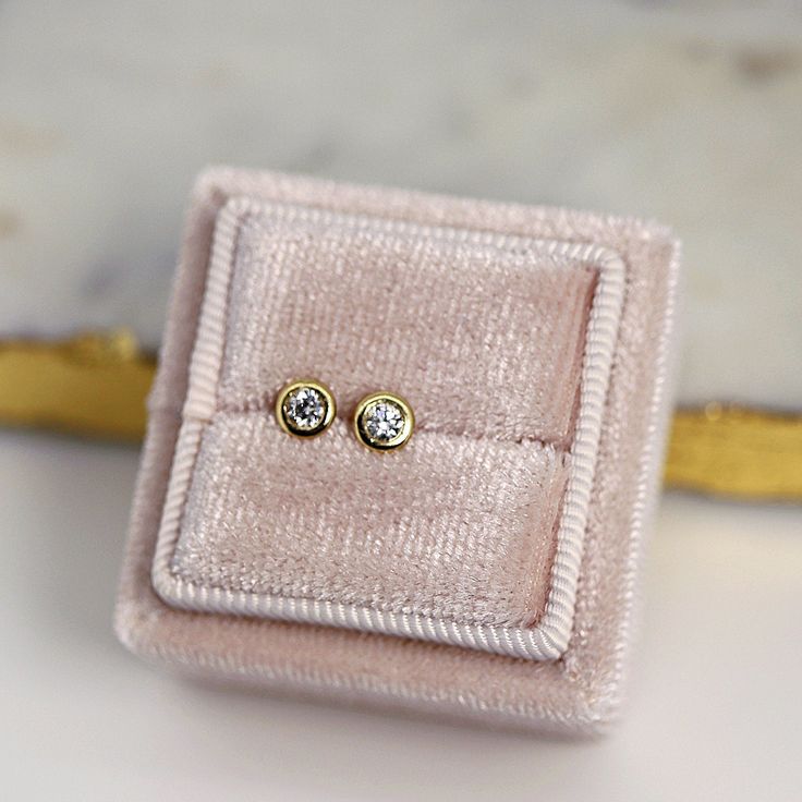 14k yellow gold and diamond stud earrings. They will make a great companion to your beautiful wedding. They are very elegant for daily use or for official gatherings.SOLD AS PAIR.Material;***14k solid gold studs***Round diamonds are 2.8mm and 0.17ct weight total.***Bezel settings.***14k gold backings included. Thanks for visiting Melt'm Design Studio Gold Studs, Bezel Setting, Diamond Earrings Studs, Diamond Studs, Round Diamonds, Beautiful Weddings, Solid Gold, Yellow Gold, Stud Earrings