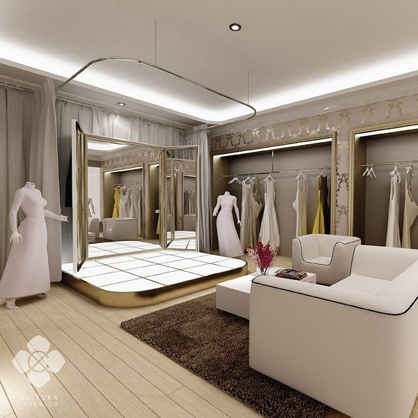 a living room filled with furniture and lots of closet space next to a white couch