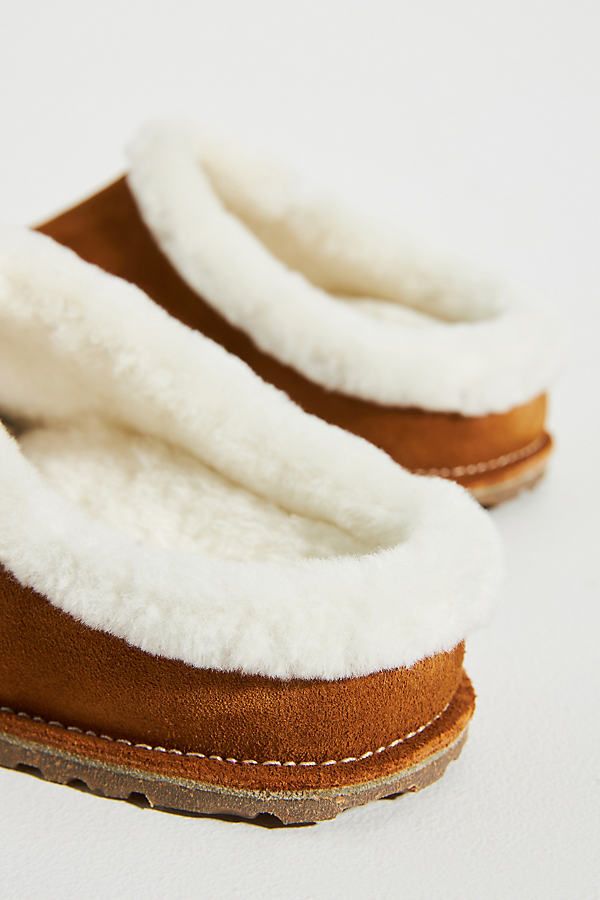 Zermatt Shearling Clogs by Birkenstock in Brown, Women's, Size: 37, Rubber/Suede/Shearling at Anthropologie Winter Clogs With Suede Lining And Comfortable Style, Winter Clogs With Suede Lining, Winter Comfortable Clogs With Suede Lining, Cozy Indoor Winter Clogs, Cozy Winter Indoor Clogs, Shearling Clogs With Leather Footbed Slip-on, Winter Suede Clogs With Leather Footbed, Comfortable Clogs With Faux Fur Lining, Comfortable Winter Mules With Suede Lining