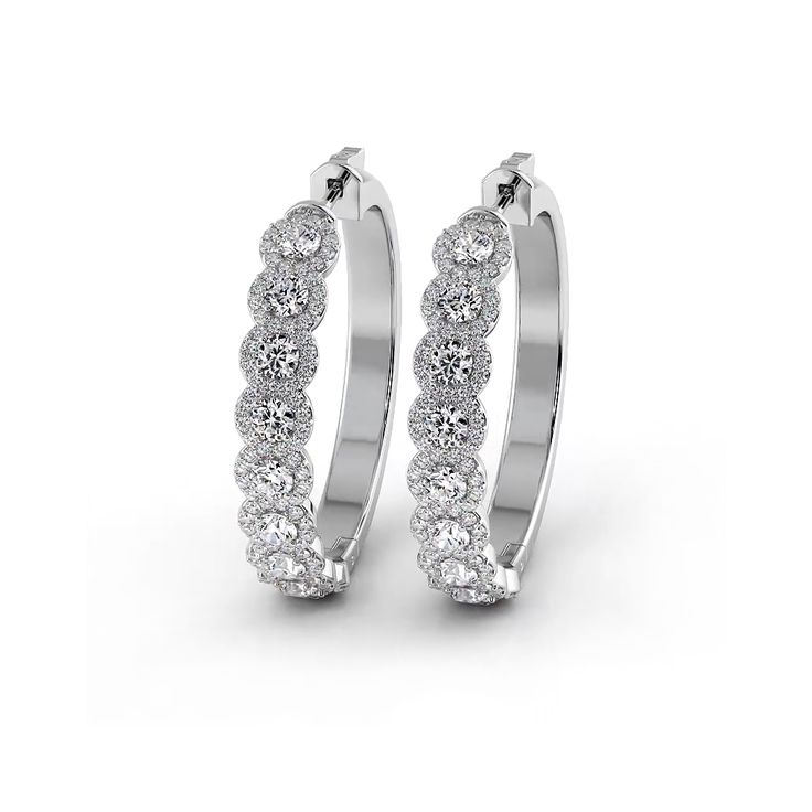 Indulge in luxury with our Brilliant Halo Round Diamond Hoop Earrings. These exquisite earrings feature sparkling round diamonds, delicately surrounded by halos. The sleek round hoops add a touch of elegance, making them perfect for any occasion. Elevate your style with these fancy hoop earrings. Diamond White Diamond Halo Hoop Earrings, Luxury Round Cubic Zirconia Hoop Earrings, Classic Halo Hoop Earrings In Diamond White, Luxury Cubic Zirconia Hoop Earrings, Halo Cubic Zirconia Diamond Hoop Earrings, Luxury Diamond Halo Hoop Earrings, White Gold Halo Hoop Earrings With Cubic Zirconia, Luxury Round Hoop Earrings With Cubic Zirconia, Diamond Halo Hoop Earrings In Fine Jewelry Style