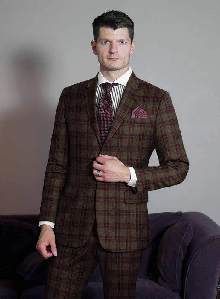 When it comes to checks, the possibilities are endless. Choose our Scabal Brown Check Wool Jacket for a more understated presence that exudes class and confidence rather than being overly loud. Custom-made from superfine merino wool, a natural fiber that offers both style and comfort in equal measure. The captivating plaid pattern, created by pink yarns on a brown background, enhances its overall look. Perfect for both official and unofficial rendezvous. 
  Look Includes    Scabal Brown Checks W Tailored Plaid Outerwear For Business, Fitted Plaid Sport Coat For Semi-formal Occasions, Semi-formal Fitted Plaid Sport Coat, Semi-formal Fall Plaid Suit, Fall Semi-formal Plaid Suit, Fitted Plaid Sport Coat With Notch Lapel, Plaid Tailored Tweed Jacket For Semi-formal Occasions, Fitted Plaid Sport Coat With Lapel Collar, Timeless Plaid Outerwear For Business Casual