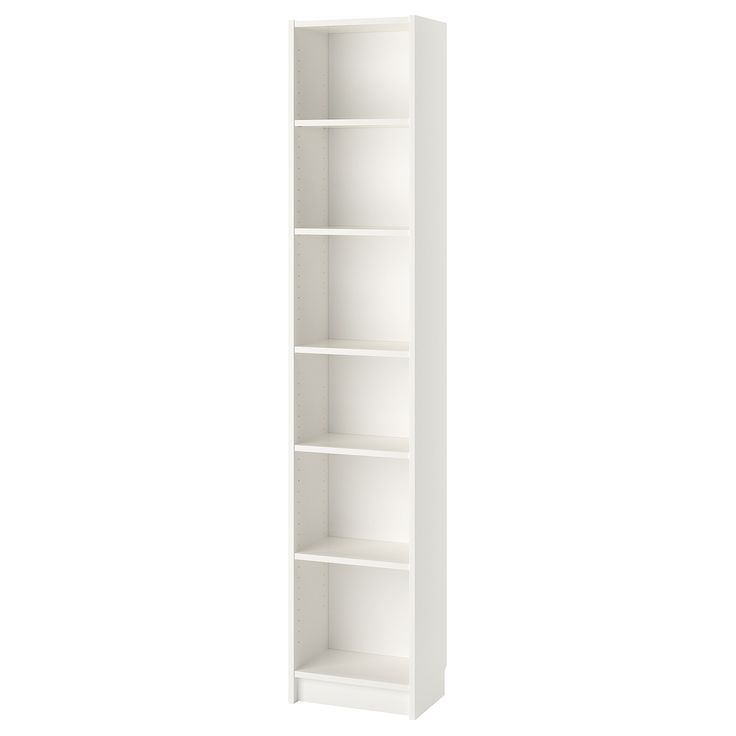 a tall white bookcase with three shelves