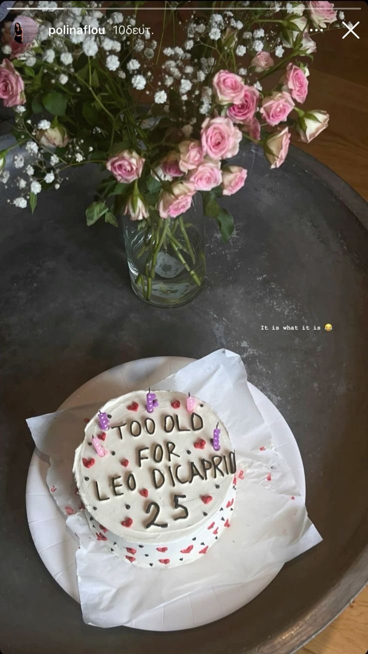 a birthday cake sitting on top of a table