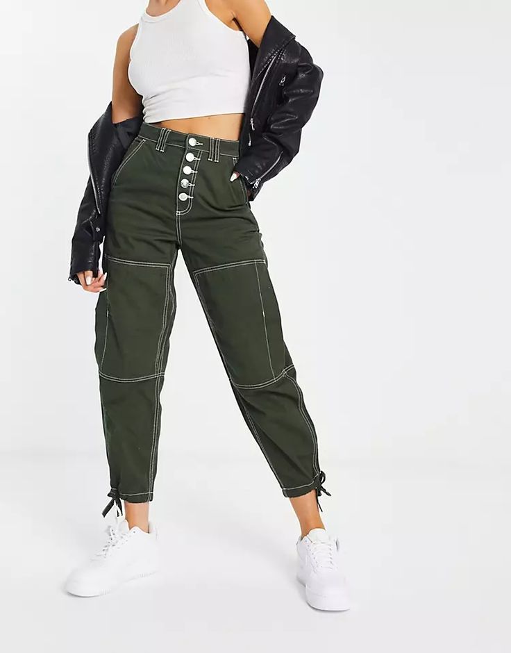 River Island utility cargo pants in khaki | ASOS Utility Cargo Pants For Spring Workwear, Spring Utility Cargo Pants For Workwear, Trendy Relaxed Fit Tapered Leg Cargo Pants, Green Cargo Style Parachute Pants For Work, Green Cargo Style Parachute Workwear Pants, Spring Military Pants With Cargo Pockets, High Waist Utility Cargo Jeans With Button Closure, Spring Military Style Parachute Pants With Cargo Pockets, Spring Military Parachute Pants With Cargo Pockets