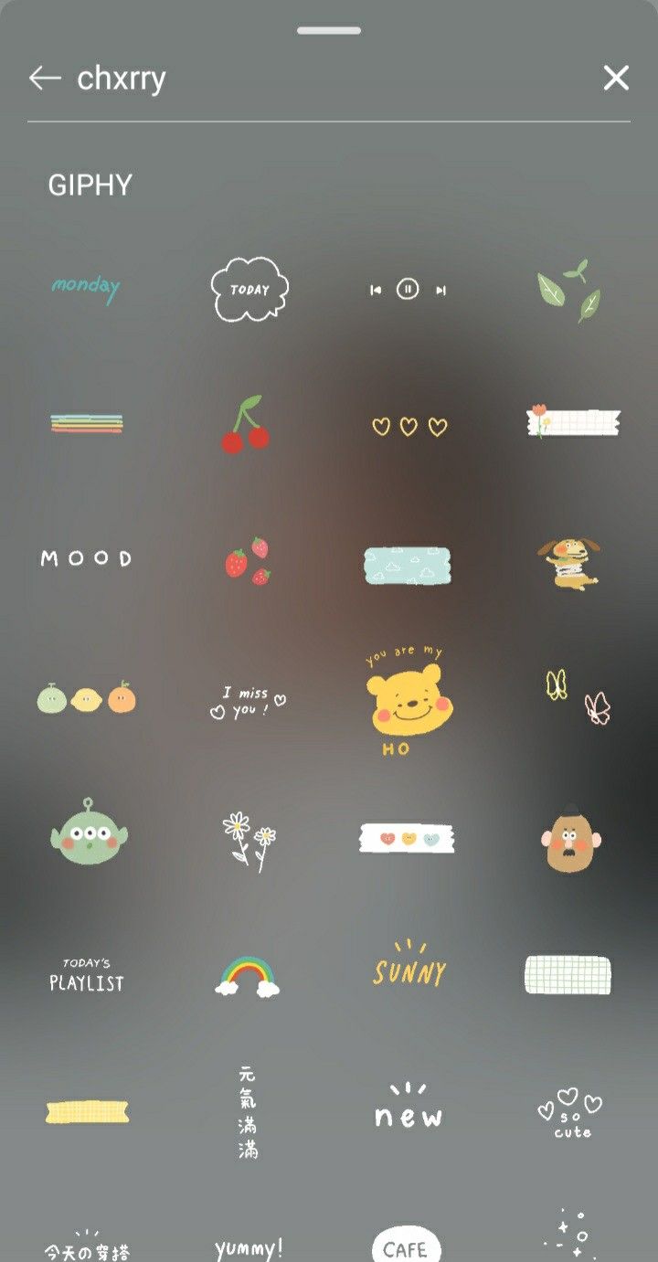 an iphone screen with various stickers and symbols on the phone, all in different colors