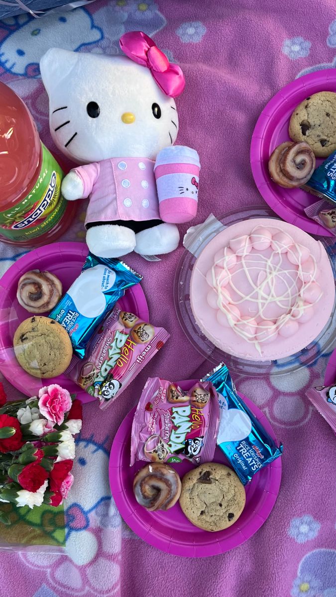 a hello kitty themed birthday party with snacks and treats